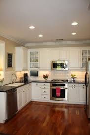 Brazilian Cherry Floors And White Cabinets Wood Floor Kitchen Kitchen Examples Cherry Wood Floors