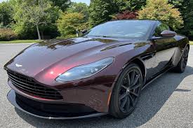 Image result for Divine Red 2023 Aston Martin