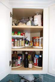 Organizing Spices Use Turn Tables In That Awkward Corner Cupboard Kitchen Corner Cupboard Kitchen Cupboard Organization Corner Kitchen Cabinet