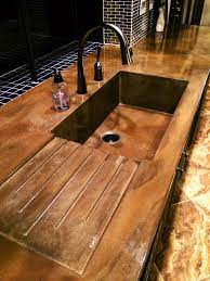 After four days (or a week, if your diy time is limited to weekends), remove the concrete countertop from the form. Concrete Kitchen Sink With Drain Board Concrete Countertops Kitchen Concrete Kitchen Replacing Kitchen Countertops
