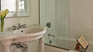 Apply the compound by filling in the holes using a putty knife, and then wiping the excess off with a sponge. Shower Glass Installers Reflect On Shower Designs Angi Angie S List