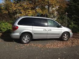 Make Dodge Model Caravan Year 2005 Exterior Color Silver Interior Color Gray Doors Five Door Vehicle Condit Dodge Models Colorful Interiors Grey Doors