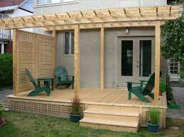 The bench provides seating on one side of the tub. Privacy Outdoor Pergola Pergola Patio Backyard Patio