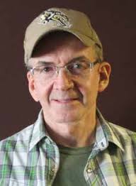 Assistant Professor Sadanand Dhekney describes his winter- hardy grape  rootstock research during the Powell Research and Extensi