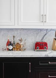 The elite 32 base cabinet is the perfect addition to your laundry room, workshop or garage. Two Tone Kitchen Features White Upper Cabinets And Black Base Cabinets Paired With White Marble Co Farm House Living Room Diy Countertops Kitchen Countertops