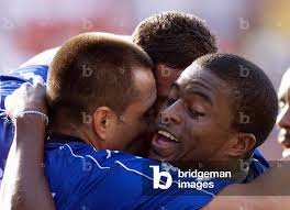 Image of Panama's Arabe Unido players John Garcia (L) Blas Perez (C)