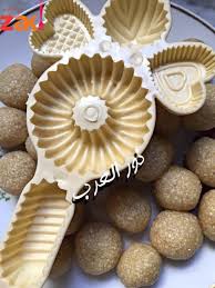 معمول بالسميد بحشوة اللوز والفول السوداني زاكي Arabic Sweets Recipes Sweets Recipes Food