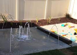 Finally, its time to build your backyard splash pad! Splash Pad For Your Backyard Mccabe S Landscape Construction