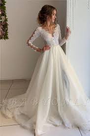 Gorgeous A Line V Neck Wedding Dresses With Long See Through Sleeves In 2020 Wedding Dresses A Line Wedding Dress Bridal Dresses Lace