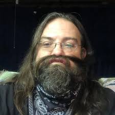 If she wants Batman give her Batman. Kids like what they like. Girls can  like Batman and superheroes. It isn't weird. I work in Prek and boys and  girls like superheroes, playing