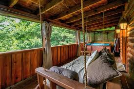 Whether you are looking for a pigeon forge cabin rental, a gatlinburg cabin rental or smoky mountain cabin rental, with a spectacular mountain view or view of the little pigeon river, aunt bug's cabin rentals offers affordable deluxe cabins to suit your family's needs and. Best Gatlinburg Airbnb Top Cabins With Hot Tubs For 2021 The Wanderlust Within