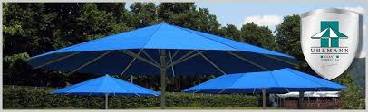 I, for one, love a good patio umbrella. Giant Umbrellas Large Commercial Umbrellas Large Patio Umbrellas