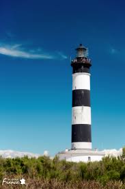 Chassiron S Light House Famous For Its Height The 140 Feet Tall Light Tower Can Be Seen From 32 Miles Away Lighthouse Tower Vacation