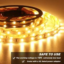 A string of led lights sits inside plastic tubing to provide lighting under cupboards and along kickboards. Novelty Lighting Bedroom Kitchen Warm White Under Cabinet Non Waterproof Tape Ribbon Light Le 16 4ft Led Strip Light Super Bright 300 Leds Smd 5050 12v Power Supply Not Included Flexible Rope Light For