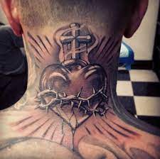 The image is a heart that is well shadowed and reminiscent of childhood memories. 200 Sacred Heart Tattoo Designs For Men And Women Update 2021 Best Neck Tattoos Neck Tattoo For Guys Sacred Heart Tattoos