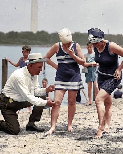 Police officers patrolled American beaches with tape measures in the 1920s, checking the length of women's swimsuits. Washington, DC set its limit at six inches above the knee in 1922, after Colonel