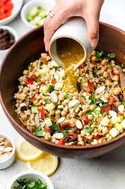 Bring chicken broth, 1 tablespoon oil, ginger, garlic, 1 teaspoon salt, turmeric, cinnamon, and cumin to boil in heavy large saucepan. 8silnjm2d63g7m