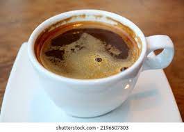 Una taza de café caliente con Foto de stock 2196507303 | Shutterstock