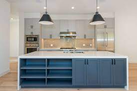 Blue grey kitchen cabinets with marble. Kitchen Navy Blue Cabinets Grey Cabinets White Marble White Oak Floors White Kitchen White Kitchen Paint White Kitchen Cabinet Handles