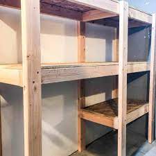 I spent about $170 on 20 foot long free standing shelving system, and built it in a few hours! Diy Garage Shelves With Plans The Handyman S Daughter