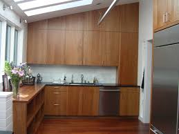 Dark gray kitchen cabinets also match the cabinets on the island and complement the look on the kitchen. Cherry Cabinet Backsplash Houzz