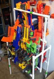 Nerf guns and blasters are the absolute best and are perfect for your young adrenalin seeking warriors. Diy Nerf Gun Cabinet Novocom Top