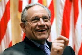 How old is Bob Woodward and what books has he written?