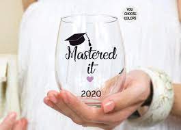 Students often walk across the stage and straight into the next. Mastered It Wine Glass Graduation Gift Masters Degree Gift Etsy Degree Gift Masters Graduation Gifts Graduation Gifts