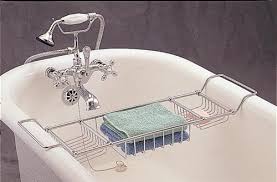 Conveniently store your soap, cell phone, snack, or drink on this caddy and have access to it without having to get out of the tub. Clawfoot Bathtub Caddy Ideas On Foter