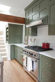 A Fresh Paint Color We Love For The Kitchen So No It S Not White Blue Or Black Green Kitchen Cabinets Kitchen Cabinet Inspiration Kitchen Cabinet Design