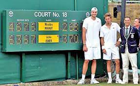 Isner belted a backhand winner, dropped to the court and screamed. Wimbledon 2010 Isner Vs Mahut