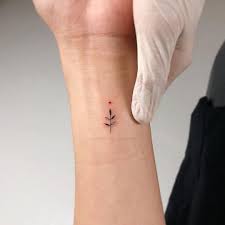 Considering A Small Wrist Tattoo We Have Pictures Of Dozens Of Tiny Wrist Tattoos To Inspire Your Next De Tiny Wrist Tattoos Small Wrist Tattoos Wrist Tattoos