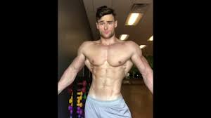 16 years old shredded teen Aesthetic bodybuilder flexing his muscles 💪 