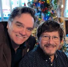 Kevin and I couldn't resist a Christmas Tree background! Happy Holidays,  everyone!