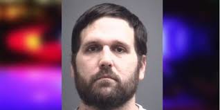 Driver passed out behind wheel while