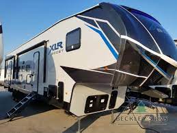 Each toy hauler features a 102 wide body design to easily load motorcycles, kayaks, extra coolers, or camp gear without having to pull an extra trailer or bring a second vehicle. Forest River Xlr Boost Toy Hauler Fifth Wheel Review 4 Luxuries You Ll Love Beckleys Rv Blog