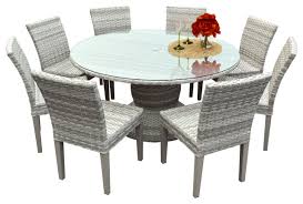 Patio tables give your property's outdoor area a comfy look and feel. Fairmont 60 Outdoor Patio Dining Table With 8 Armless Chairs Tropical Outdoor Dining Sets By Design Furnishings Houzz