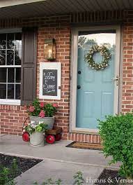Front porch decorated for thanksgiving day with homemade wreath hanging on door. 22 Brown Brick Home Colors Ideas House Colors Exterior Paint Colors House Exterior