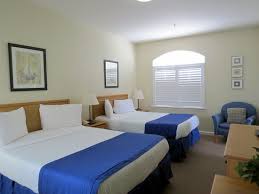 In living room sofa and tv include also dinning. Two Queen Beds In Master Bedroom Picture Of Pacific Plaza Resort Oceano Tripadvisor