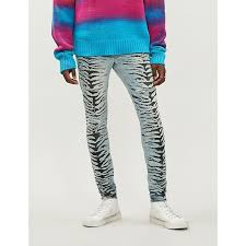 Amiri Destruction Slim Fit Faded Tiger Print Skinny Jeans