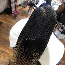 The hair is curly and looks exceptional braided. Sira African Hair Braiding Home Facebook