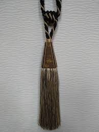 Here is a forged hand made curtain holdback in a view of a nice branch with leaves. Brown Black Tiebacks Curtain Tie Backs Modern Tassel Hold Backs