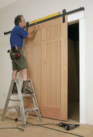 You can expect to pay about $500 to $1,000 per door when constructing a new home. How To Install A Sliding Barn Door Fine Homebuilding