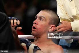 Jay Estrada of the Chicago Red Bears tries to defend himself against...  News Photo