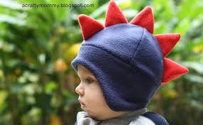 Sew the band to the top of the hat and you are done! Stitched By Crystal Tutorial Dino Hat