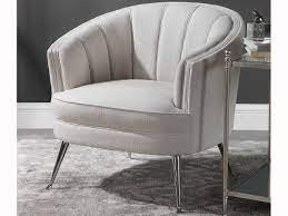Hand carved, solid mango wood in antique silver leaf with plush, zebra. Uttermost Janie Cream Polished Nickel Accent Chair Ut23510