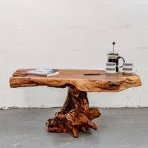 The rustic solid oak coffee table is manufactured using a particular type of solid oak to give it that warm rustic appearance. Rustic Coffee Tables You Ll Love Wayfair Co Uk