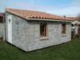 Combien cote un garage en parpaing, un mur ou une palette de