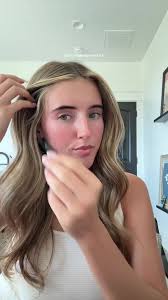 Emery Chipman Curling Hair