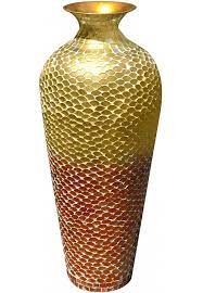 Metallic rose gold or silver metal vase via: Best Tall Metal Floor Vase With Glass Mosaic In Gold Orange At Decorshore